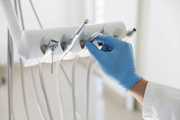 Professional Emergency Dentist technician working in Pleasanton, KS
